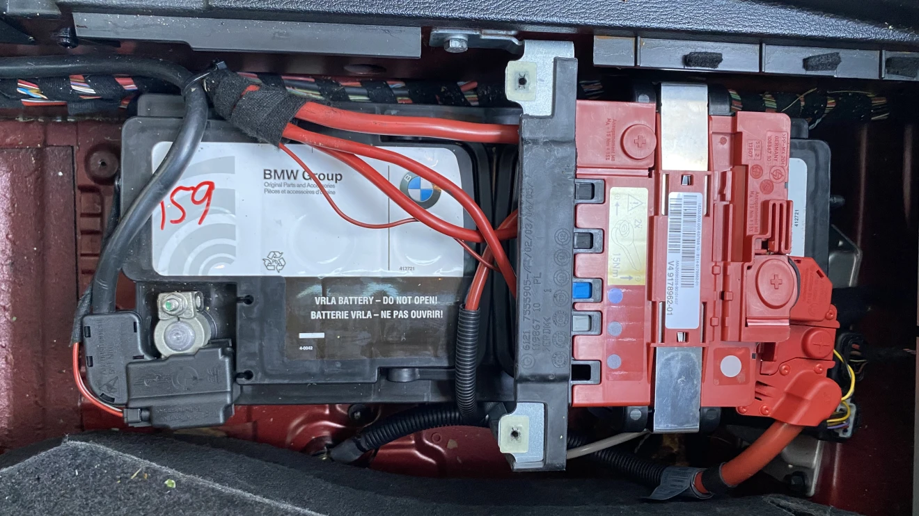 Technician testing battery